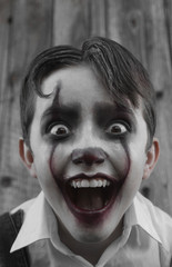 Portrait of a clown. Emotional photo. Evil clown