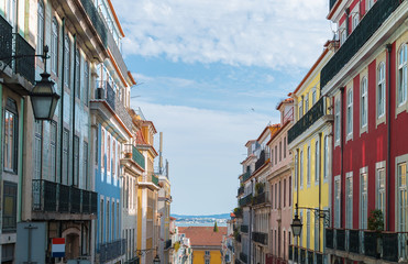 Fototapeta na wymiar Beautiful colorful old street in Lisbon.