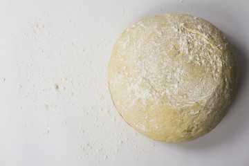 dough with close-up. man is preparing bread dough