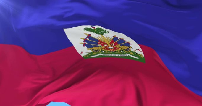 Haitian flag waving at wind with blue sky, loop