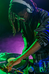 DJ with sound mixer on concert