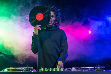 african american DJ with vinyl