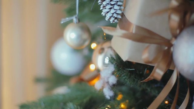 Christmas tree with garlands and toys, close-up