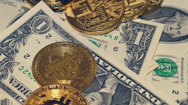 Bitcoins Falling On One Dollar Bills