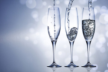 Silver sealed champagne on a background with space for advertising text 