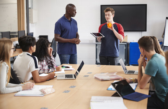 College Student Making Presentation In CAD/3D Printing Class