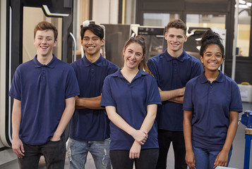 Portrait Of Engineering Apprentices In Factory - obrazy, fototapety, plakaty