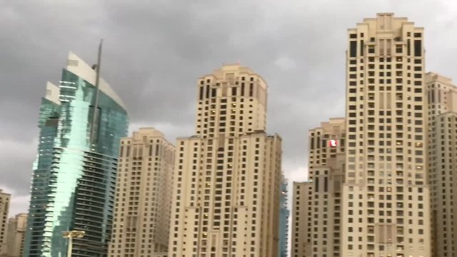 DUBAI &ndash; DECEMBER 2016: Dubai Marina skyline at sunset. The city attracts 20 million people annually.