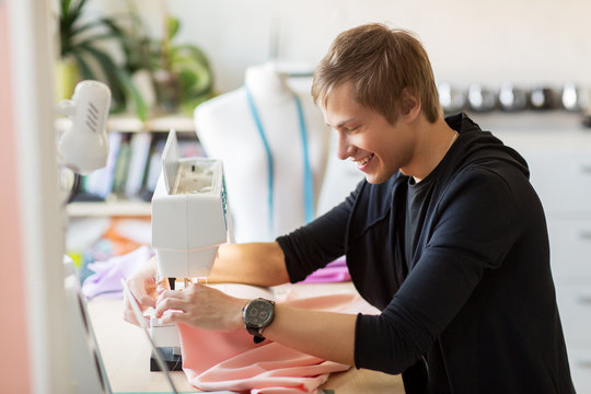 fashion designer with sewing machine working