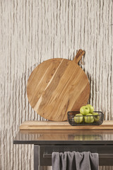 Kitchen utensils on wall and table, nice interior wooden design background chopping table style