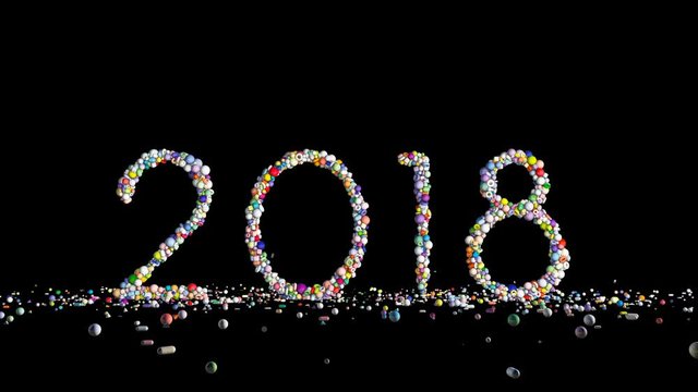 New Year 2018 sign made from colorful globes, against black