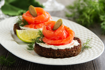 sandwiches with rye bread with salted salmon.