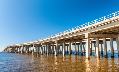 Long bridge over shallow waters