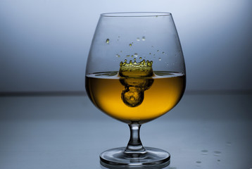 Wine splash in glass