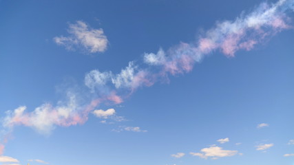 Beautiful three colored clouds on a blue sky.