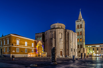 Fototapeta na wymiar St. Donatus and Bell Tower at blue hour in the old town, Zadar, Croatia