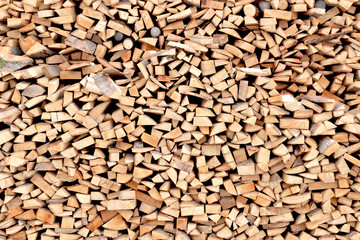 woodpile with firewood. photo on the theme of wood texture background, material design