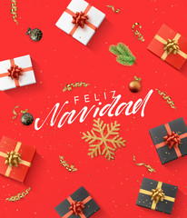 Spanish text Feliz Navidad. Christmas composition. gift, confetti, golden snowflake and balls, Xmas tree branch.
