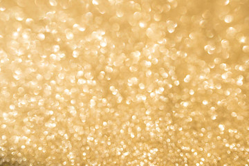 Abstract golden glitter bokeh background