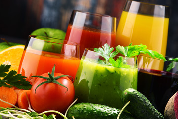 Glasses with fresh organic vegetable and fruit juices