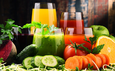 Glasses with fresh organic vegetable and fruit juices