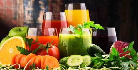 Glasses with fresh organic vegetable and fruit juices