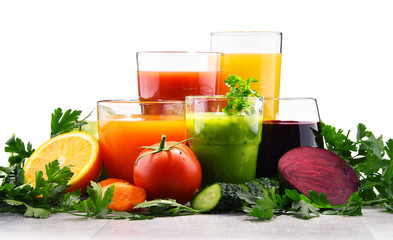 Glasses with fresh organic vegetable and fruit juices