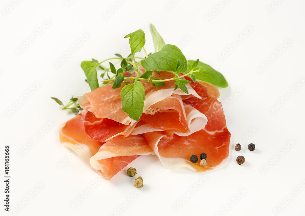 Poster air dried ham with thyme and pepper