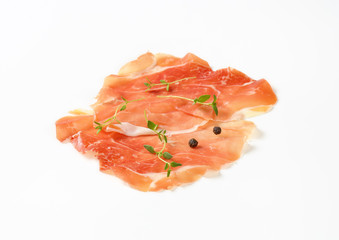 air dried ham with thyme and pepper