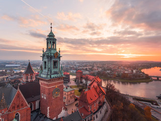 Krakow - Wawel castle at sunset time, frome above, aerial drone view, panorama of the Wawel Royal Castle. With sunset sky.
