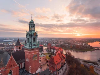 Peel and stick wall murals Krakau Krakow - Wawel castle at sunset time, frome above, aerial drone view, panorama of the Wawel Royal Castle. With sunset sky.