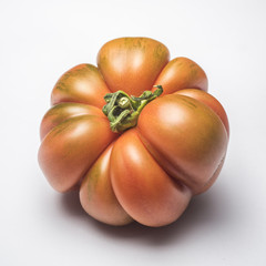 Costoluto Pachino tomato on white background