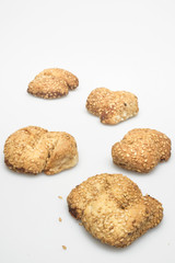 cookies with sesame seeds on a white background