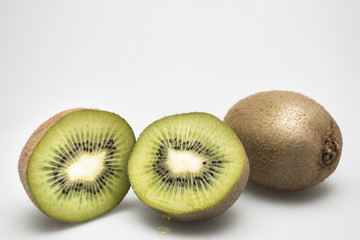 kiwi cut with drop on white background