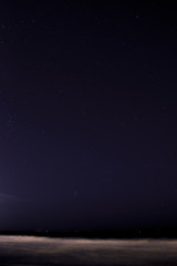 Starry sky on the beach of Guardamar del Segura at night