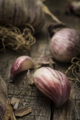 Sicilian garlic on wood background