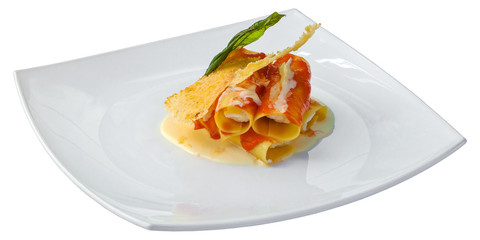 Italian food - Cannelloni with sauce and cheese. 