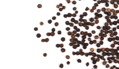 Black pepper isolated on white background, top view