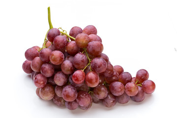 Ripe red grape isolated on white.