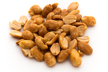 Peeled peanuts on the isolated background.