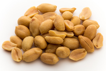 Peeled peanuts on the isolated background.