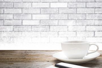 Wooden table on white wall and snow Christmas winter background.