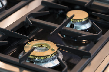 Burners metal gas hob surface plates are shot close-up