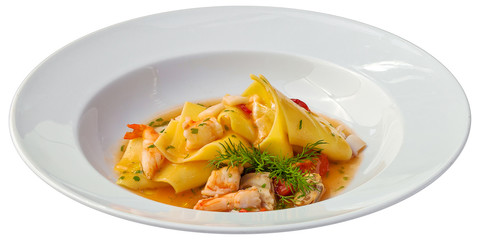 Ravioli with shrimps and tomato sauce isolated on white background