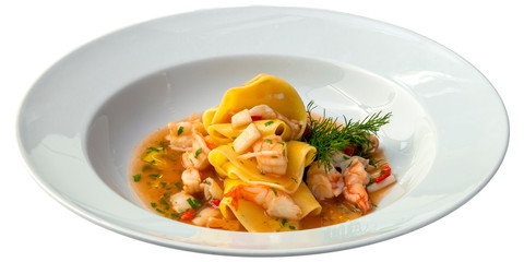 Ravioli with shrimps and tomato sauce isolated on white background