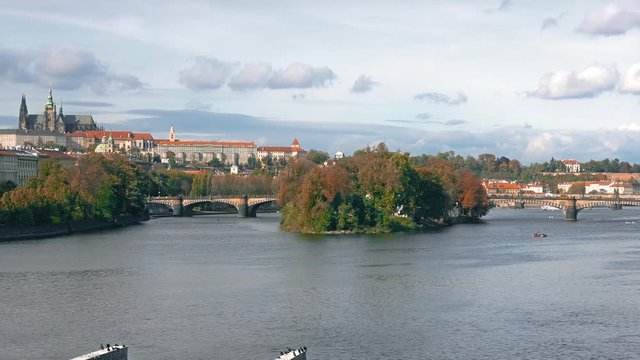 View of the Old Town architecture with red roofs in Prague , Czech Republic. St. Vitus Cathedral in Prague. Vltava river. old town panorama , Czech republic.