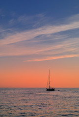 sailing boat at the dawn