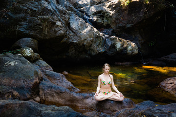 Yoga session by waterfall on Koh Chang