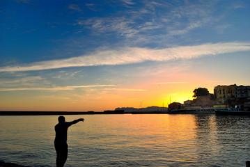 Sunrise at the port of Chania in Crete Greece