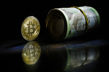 Golden bitcoin on black background with copy space cryptocurrency mining concept